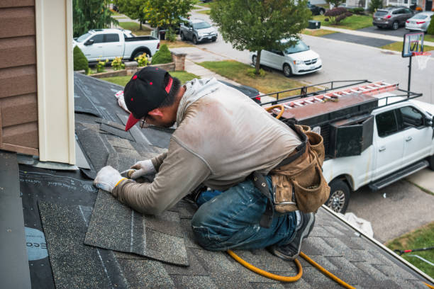 Professional Roofing technician working in Hilltop, MN